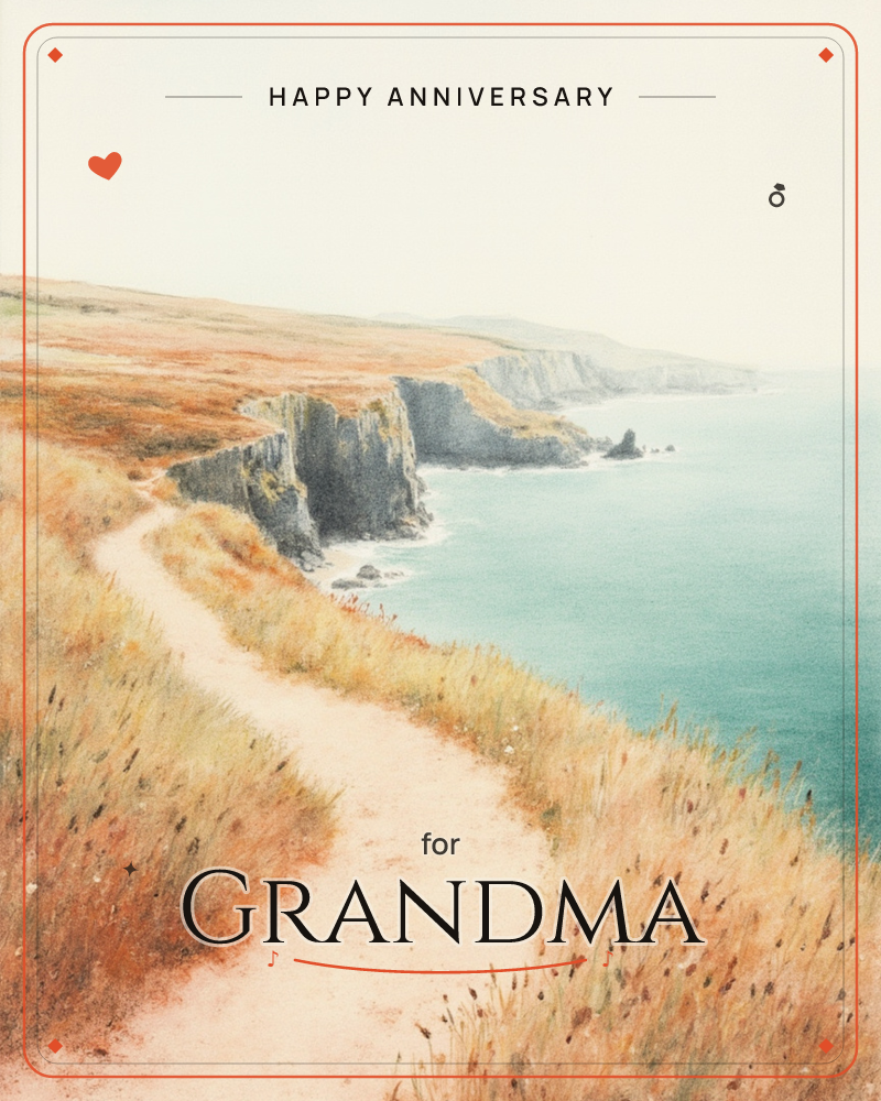 A sandy path winds along a coastal cliff top, edged with tall autumn-toned grasses and a scattering of small wildflowers, a anniversary e-card design