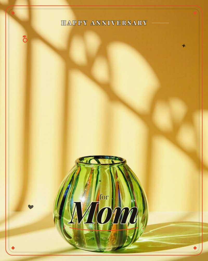 A round green ribbed glass vase sits empty on a pale surface against a warm yellow wall, sunlight throwing a long leafy plant shadow across the background, a anniversary e-card design