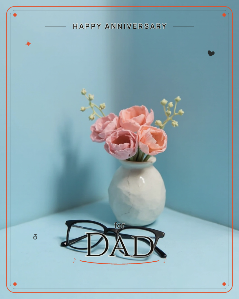 A small marbled white vase holds soft pink peonies and sprays of tiny cream buds, sitting on a pale corner ledge beside a folded pair of black glasses, a anniversary e-card design