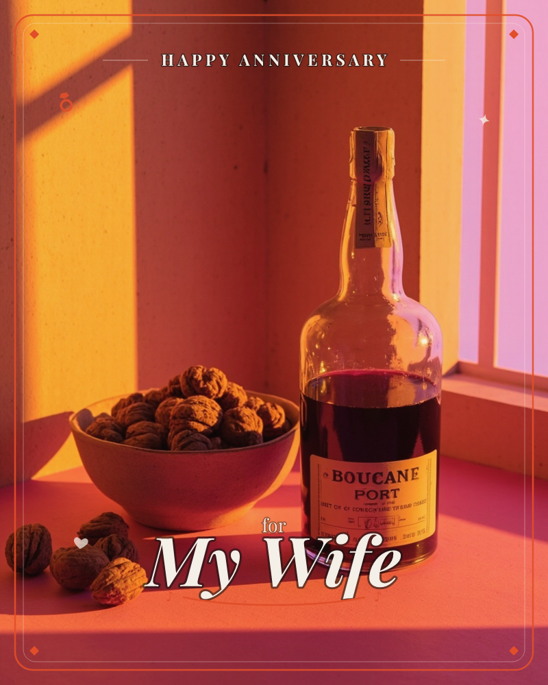 A photographic still life bathed in warm evening light shows a bottle of port wine beside a bowl of whole walnuts, a few scattered loose on the tabletop, a anniversary e-card design