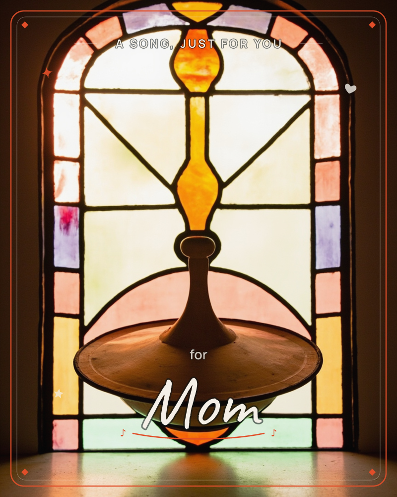 An arched stained-glass window glows softly with panes of amber, coral, lavender and pale green, forming a symmetrical pattern that frames a small…, a any occasion e-card design