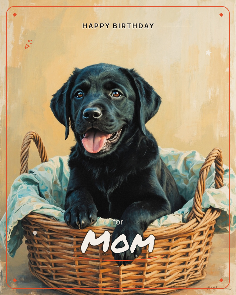 A glossy black Labrador puppy sits inside a woven wicker basket lined with a pale floral cloth, paws draped over the rim and tongue out in a happy pant, a birthday e-card design