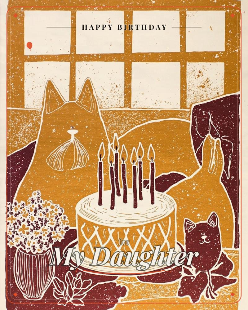 A linocut-style print shows two stylised cats flanking a birthday cake with seven lit candles, set before a paned window, a birthday e-card design