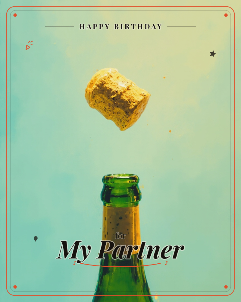 A champagne cork hangs frozen in mid-air just as it pops free from a green glass bottle, tiny droplets scattering around it, a birthday e-card design