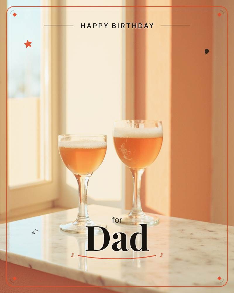 Two glasses of amber, foam-topped beer sit side by side on a marble ledge beside a sunlit window, a birthday e-card design