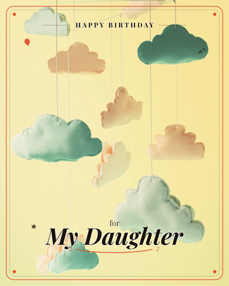 A nursery-style mobile of soft fabric clouds in teal, mint and peach hangs suspended on fine threads against a warm buttery-yellow background, a birthday e-card design