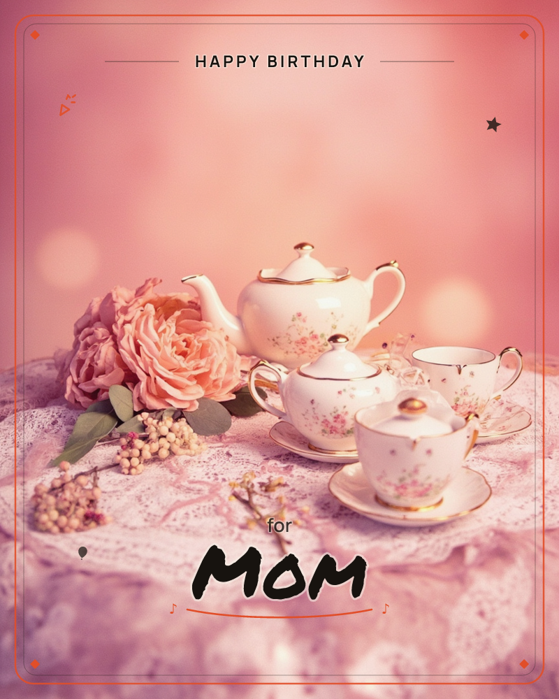 A vintage floral-patterned teapot, sugar bowl, and teacups sit on a lace-covered table alongside a blush pink rose and sprigs of dried berries, a birthday e-card design