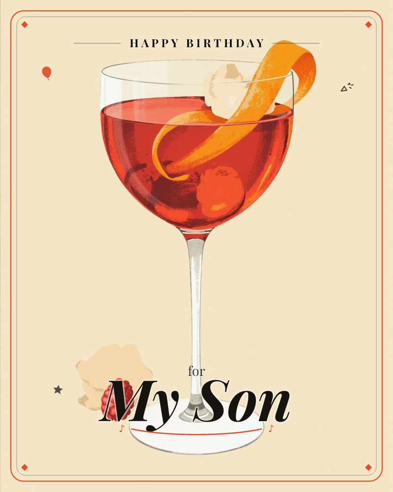 A coupe glass filled with a deep red cocktail sits against a warm cream vignette, an orange twist curling over the rim and a cherry resting inside, a birthday e-card design
