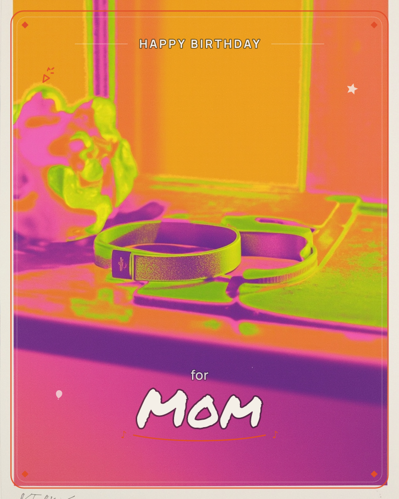 A high-contrast, solarised photograph turns an ordinary windowsill still life into a blaze of colour: a coiled leather collar or strap and a crumpled…, a birthday e-card design