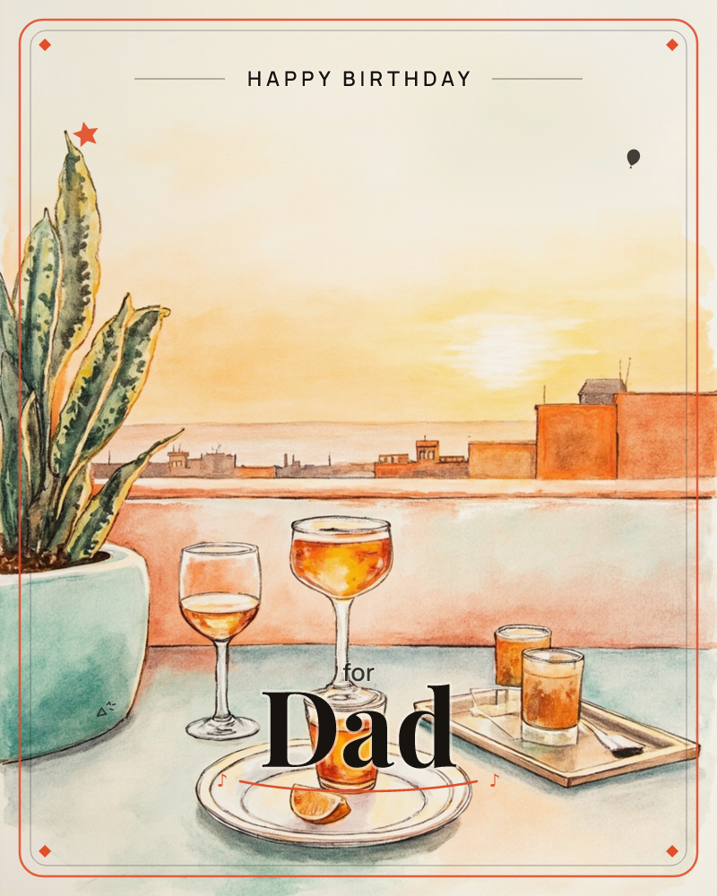 A rooftop table is set with a coupe glass and a wine glass of amber cocktails, a tumbler on a small plate with an orange wedge, and two more glasses on…, a birthday e-card design