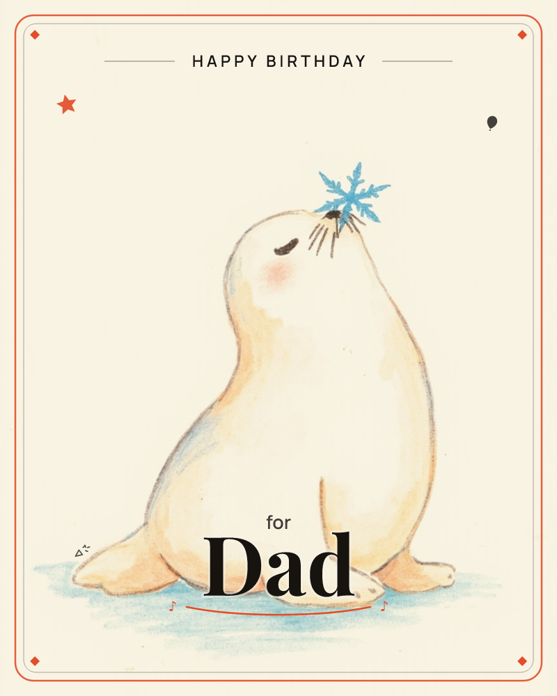 A creamy watercolour seal pup sits upright with eyes closed and rosy cheeks, tilting its face up to balance a single blue snowflake on the tip of its nose, a birthday e-card design