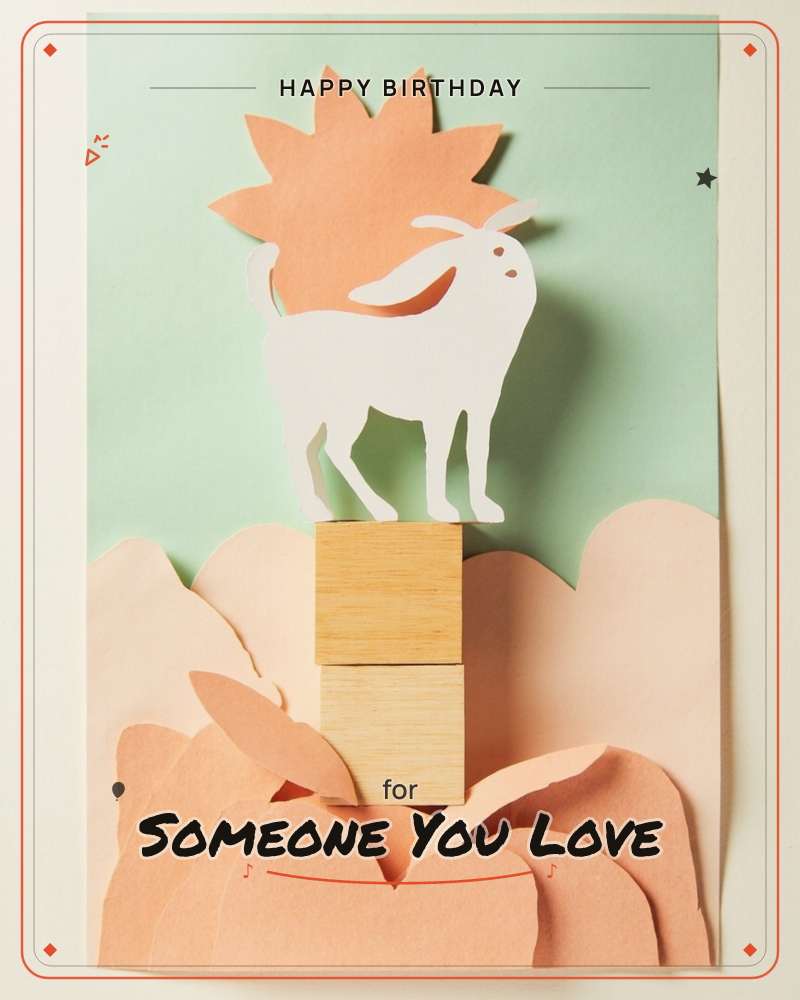 A white paper-cut goat stands proudly atop two stacked wooden blocks, its head raised toward a spiky peach-coloured paper sun against a soft mint-green…, a birthday e-card design
