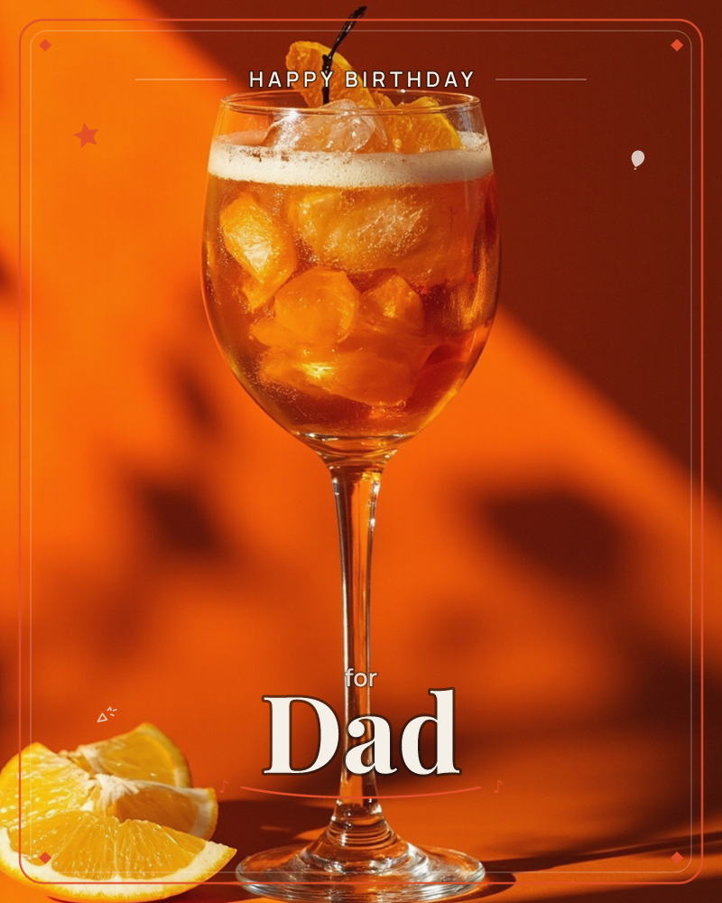 A stemmed glass filled with an amber spritz and ice sits against a bold orange backdrop, garnished with a curled orange slice on a cocktail pick, a birthday e-card design