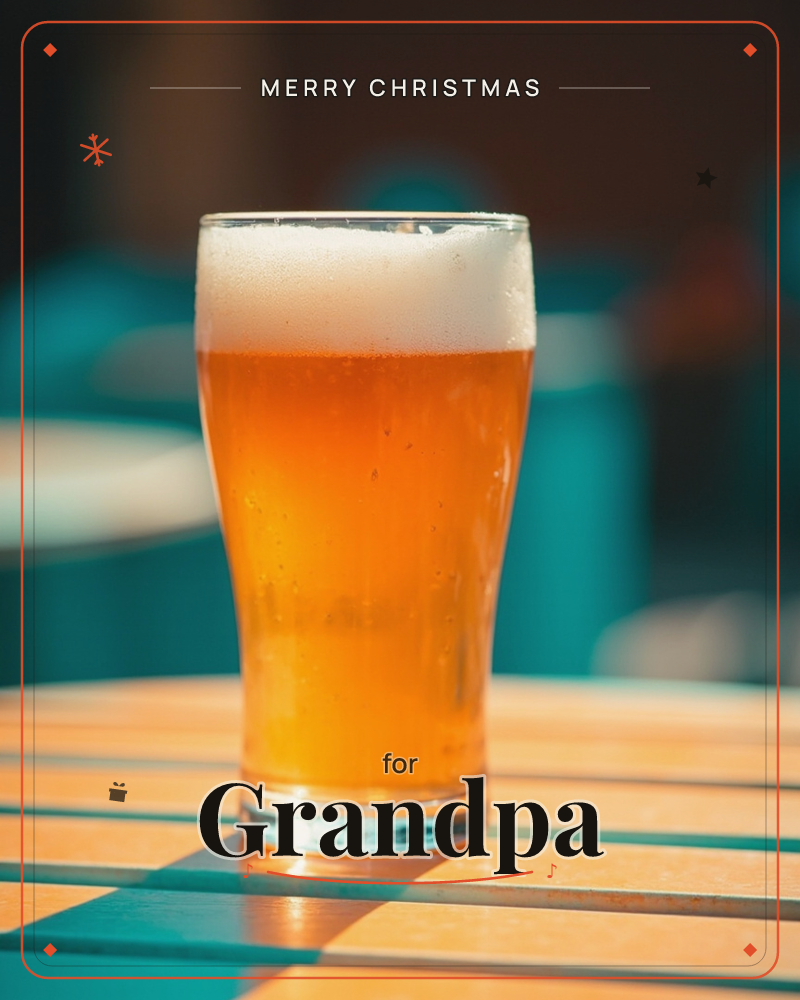 A tall glass of golden beer sits on a slatted wooden table, sunlight glowing through the amber liquid and its thick white foam head, a christmas e-card design