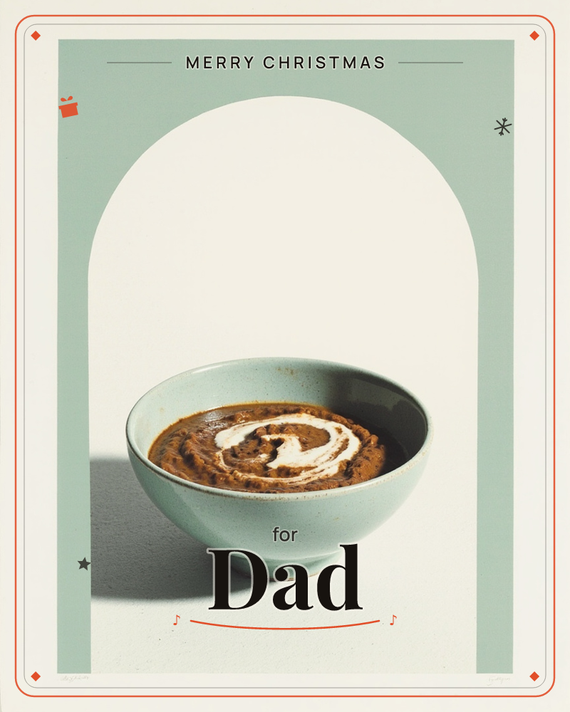 A pale sage-green arch frames a matching ceramic bowl filled with a rich brown stew or lentil soup, swirled with a spoonful of cream on top, a christmas e-card design