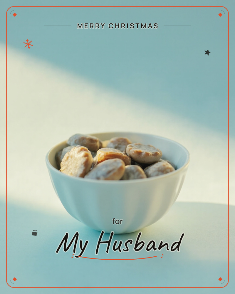 A small white fluted bowl sits on a pale blue surface, filled with dried fava beans catching a sharp diagonal beam of light, a christmas e-card design