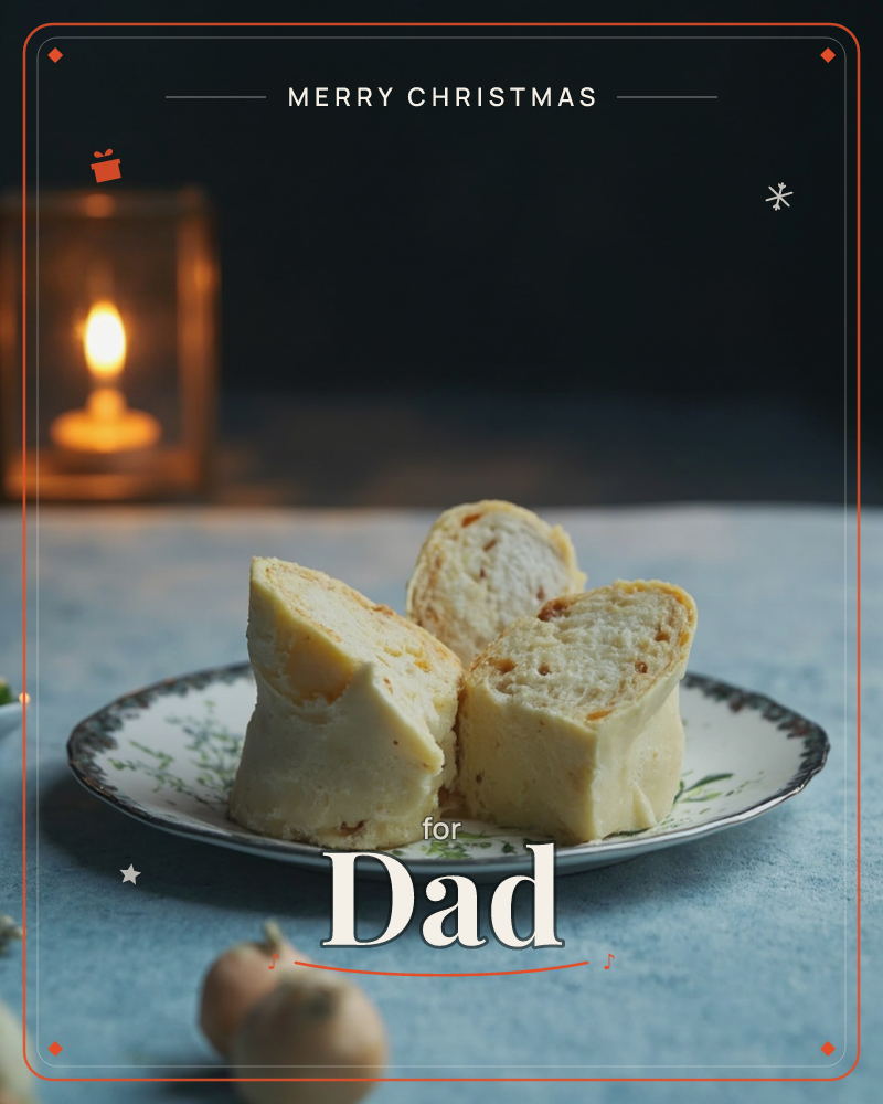 A small floral plate holds two rolled slices of savoury bread, their pale dough studded with flecks of orange filling, set against a moody dark backdrop, a christmas e-card design