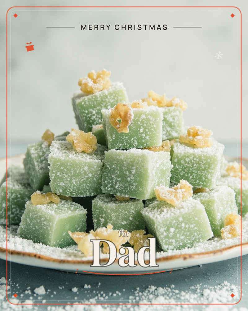 A stack of pale green fudge cubes, dusted heavily with powdered sugar and topped with pieces of golden candied ginger, is piled high on a rustic…, a christmas e-card design
