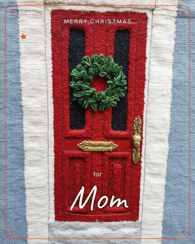 A textile illustration of a red front door, stitched in thick looped yarn to look like a hooked rug, with a small green wreath hung between two dark…, a christmas e-card design