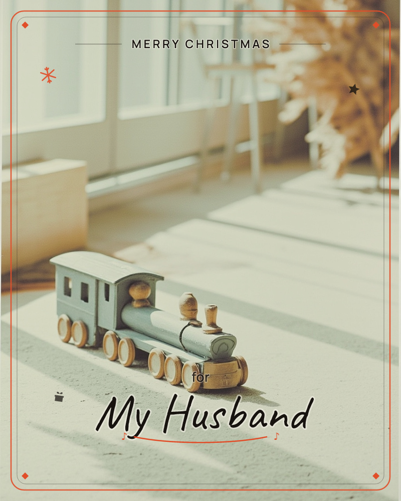 A wooden toy train sits alone on a sunlit floor, its pale blue-grey paint catching soft window light, a christmas e-card design