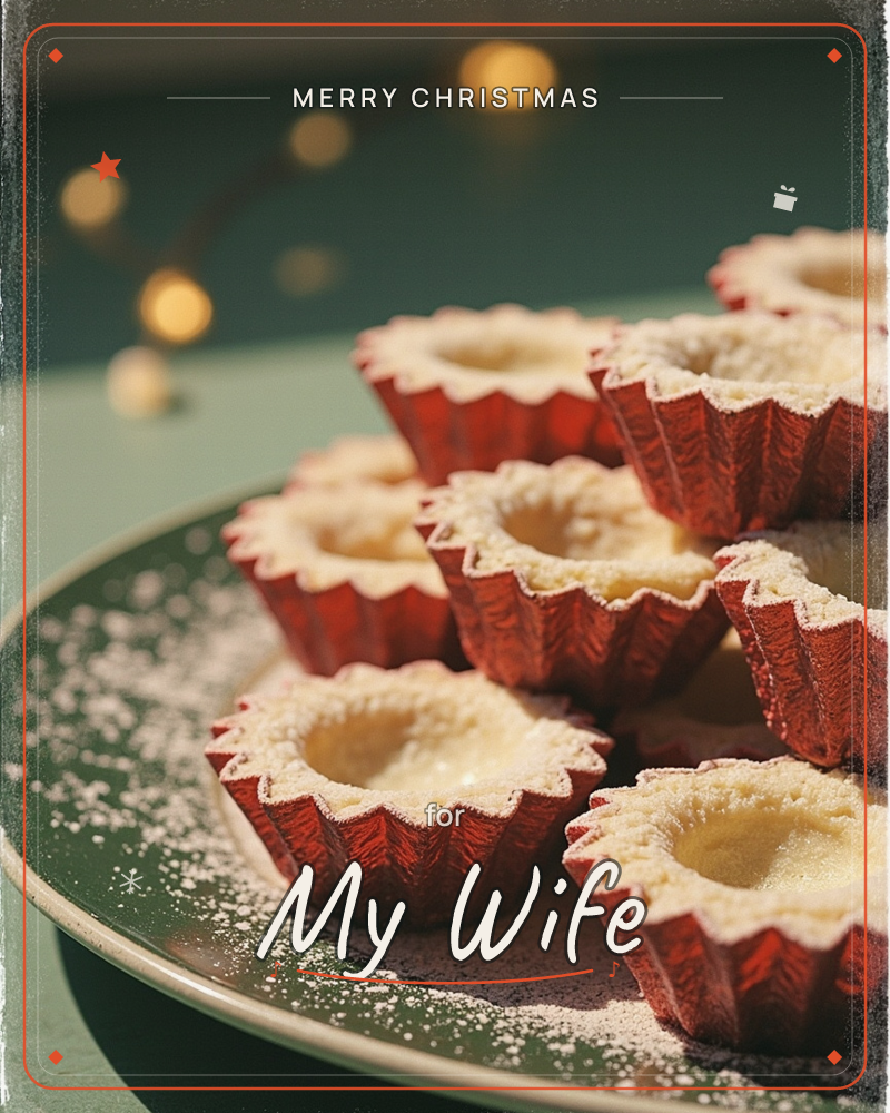 A green plate is piled with mince pies in crinkled red foil cases, each one dusted with a light snowfall of powdered sugar, a christmas e-card design