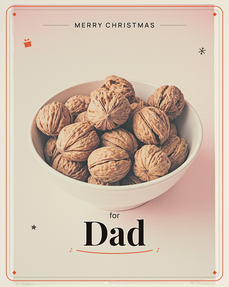 A plain white bowl sits heaped with unshelled walnuts, their ridged brown shells catching a soft, even light, a christmas e-card design