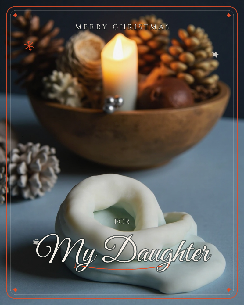 A wooden bowl holds pinecones, dried orange slices and a glowing pillar candle, its warm light standing out against the deep blue-grey background, a christmas e-card design