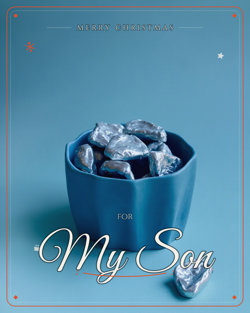 A scalloped-edge ceramic bowl sits against a flat blue backdrop, filled with foil-wrapped chocolates crumpled into rock-like shapes, a christmas e-card design