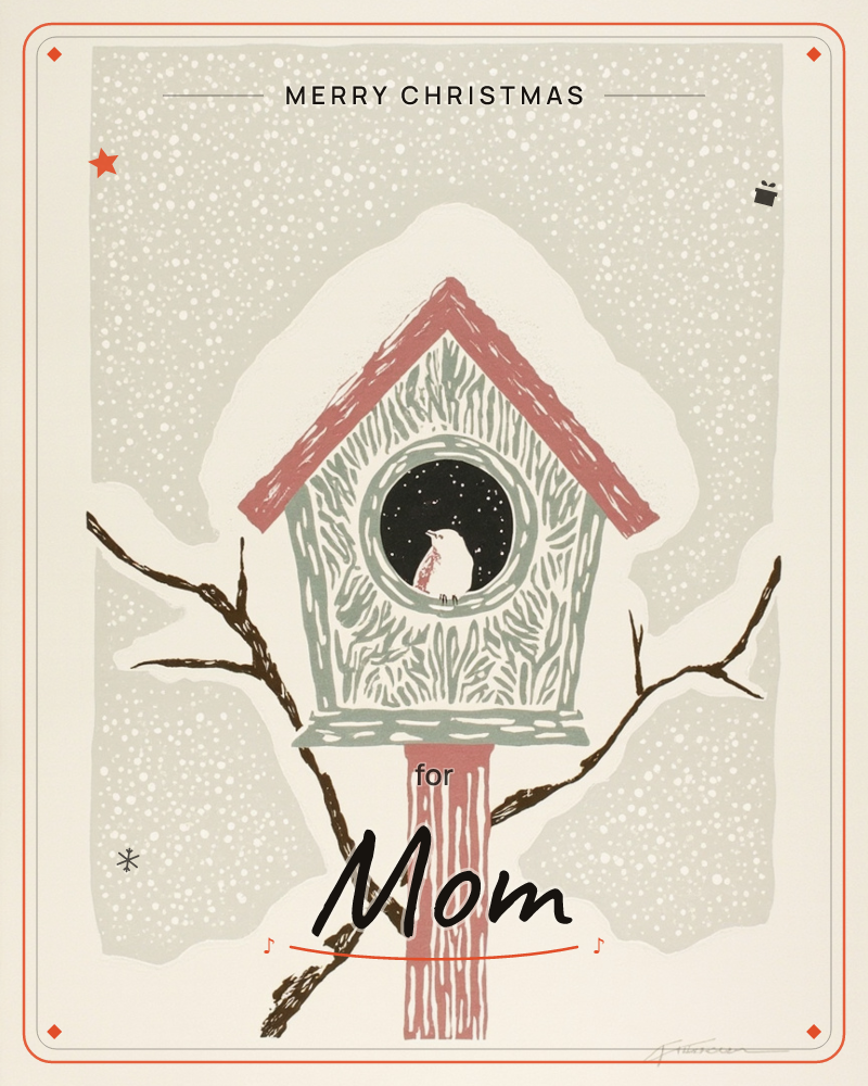 A textured birdhouse with a rose-red roof and post sits atop a bare, forking branch against a softly falling snow, a christmas e-card design