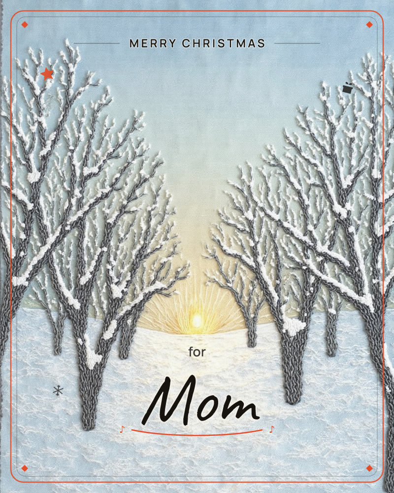 A textile-stitched winter scene shows bare, frost-tipped trees lining an avenue of snow, their branches embroidered in fine grey and white thread, a christmas e-card design