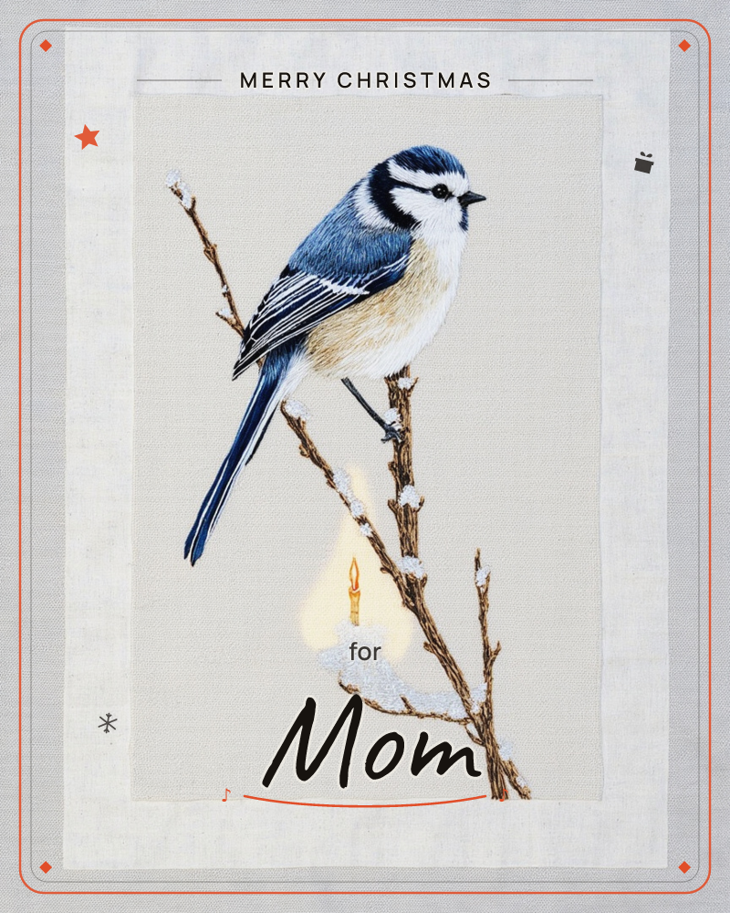 A blue tit perches on a snow-dusted branch, rendered in fine embroidered thread against a soft linen background, a christmas e-card design