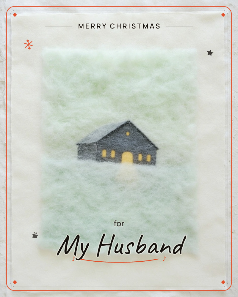 A small dark house with glowing yellow windows and doorway sits nestled in a soft, cloudy mist of pale green fibrous texture, resembling felted wool, a christmas e-card design
