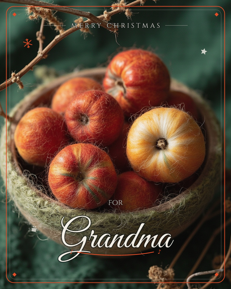 A woven bowl overflows with felted apples in autumn shades of red, orange and gold, their fuzzy wool texture catching a soft, low light, a christmas e-card design