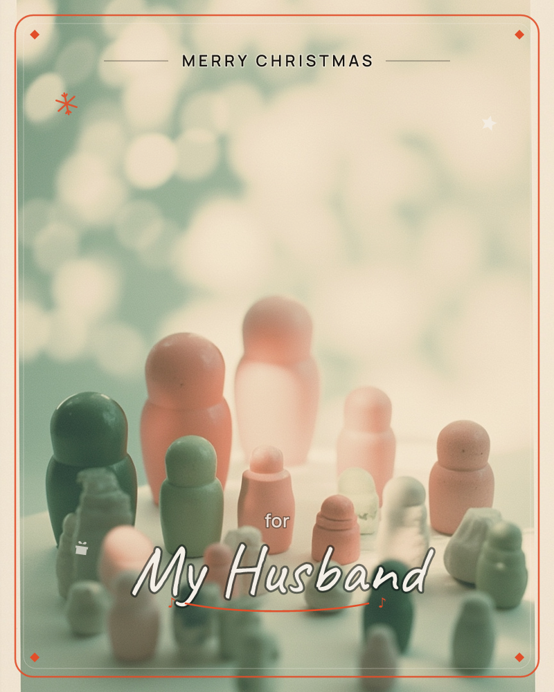 A little crowd of rounded wooden peg figures, painted in soft peach, sage and grey, stands clustered on a pale tabletop like a tiny gathered family, a christmas e-card design