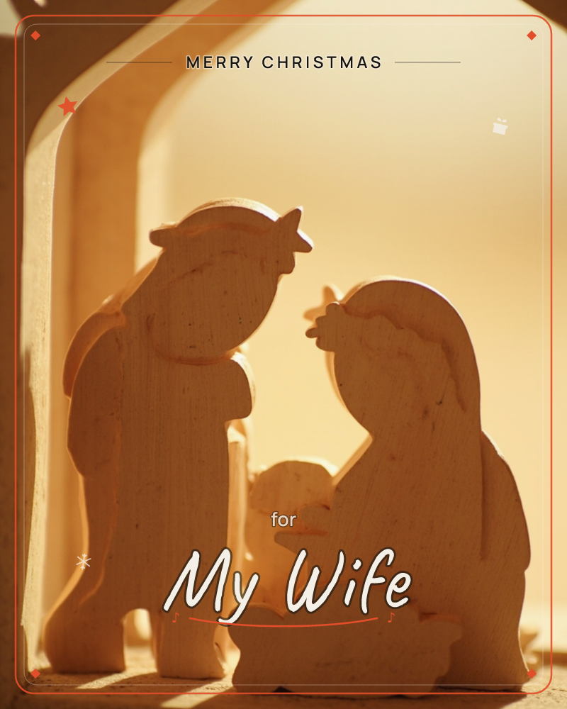A close-up photograph of a carved wooden nativity set, the two flat figures leaning toward each other over a tiny swaddled shape between them, glowing…, a christmas e-card design