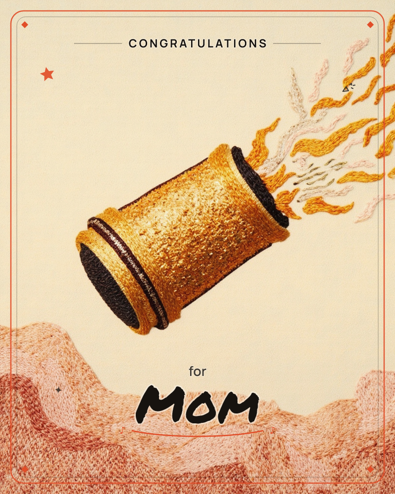 A golden cannon, rendered in dense stitched thread, hovers above a rolling blush-pink hillside and fires a burst of orange, gold and cream flames upward, a congratulations e-card design