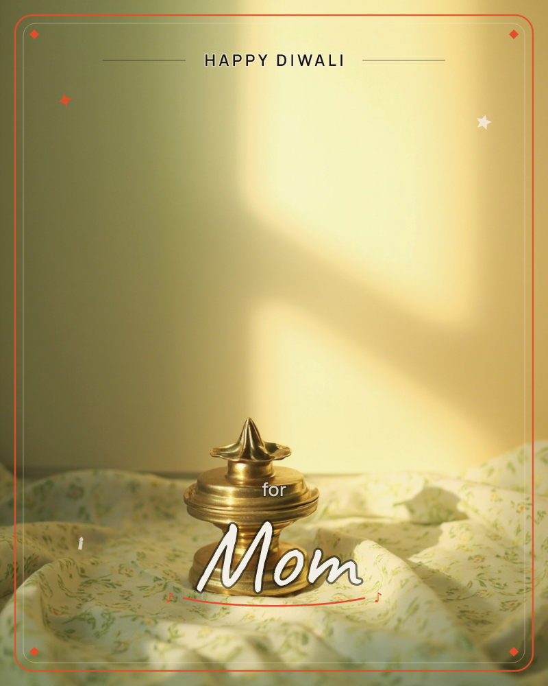 A small brass finial sits atop a rumpled, floral-print cloth, catching a warm shaft of late afternoon light that slants across the wall behind it, a diwali e-card design