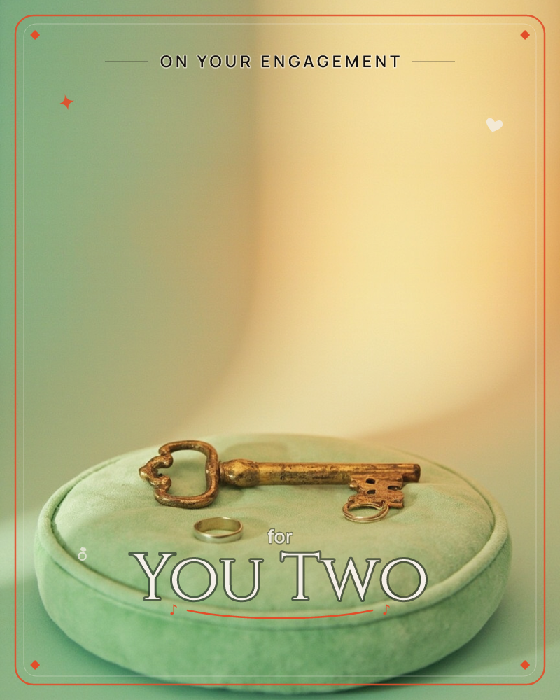 A weathered brass skeleton key rests on a round, pale sage velvet cushion, with a slim silver ring set beside it, a engagement e-card design