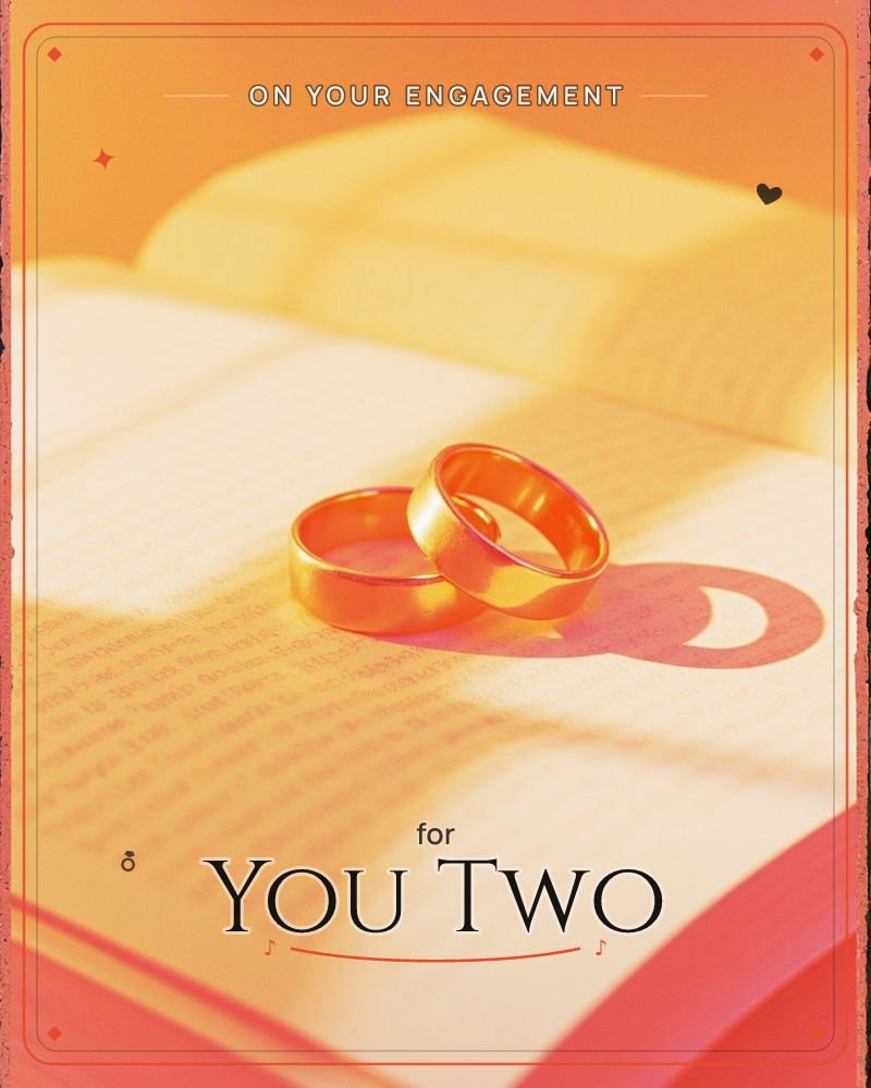 Two gold wedding bands rest together on the open pages of a book, caught in warm amber light that casts a soft looping shadow across the text, a engagement e-card design