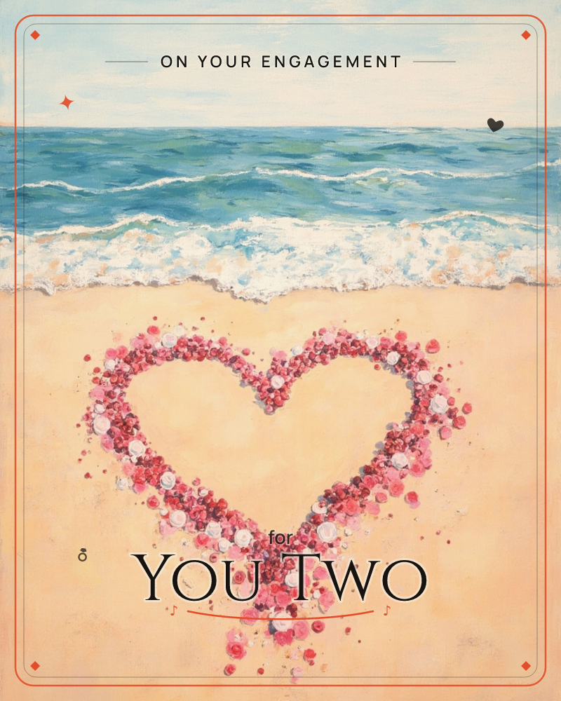 A sandy shoreline meets a rolling turquoise sea, with a heart shape formed entirely of scattered pink, red, and white pebble-like blooms sitting on the…, a engagement e-card design