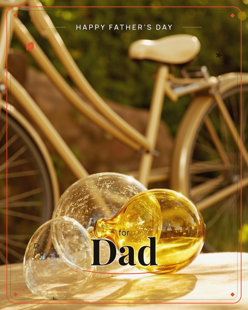 A tan bicycle leans in soft golden-hour light against a blurred green garden backdrop, its frame catching warm sunset tones, a fathersday e-card design