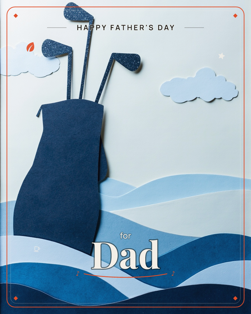 A paper-cut golf bag with three glitter-tipped clubs stands atop layered navy and sky-blue hills, with two soft paper clouds floating above against a…, a fathersday e-card design
