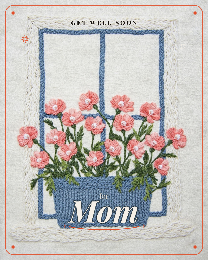 An embroidered window box sits against a cream linen ground, its blue-stitched panes framed in cream chain-stitch, a getwell e-card design