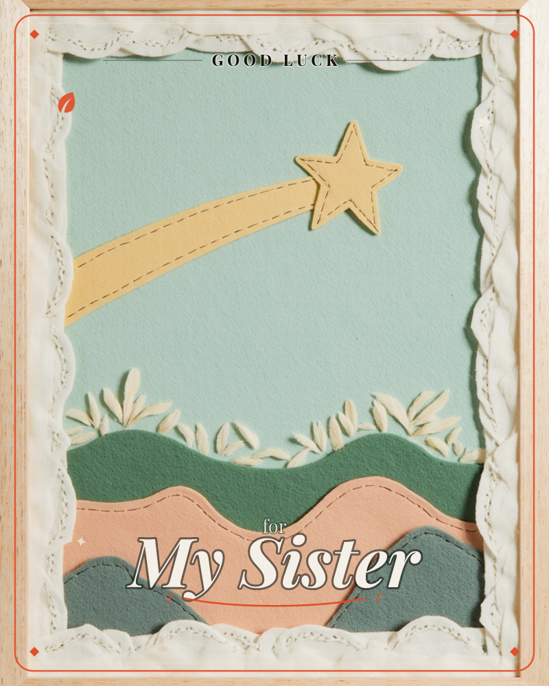A layered paper-craft landscape shows a golden shooting star streaking across a soft mint-green sky above rolling felt hills in green, peach and slate…, a good luck e-card design