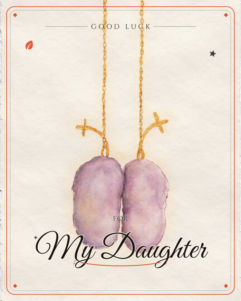 A pair of pale purple, pebble-shaped pods hang side by side from delicate gold chains, each attached with a small curling gold stem, a good luck e-card design