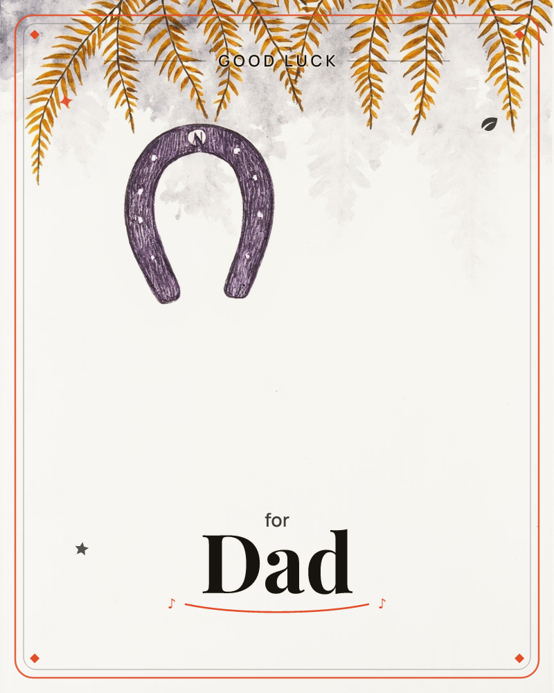 A plum-purple horseshoe hangs upside down beneath a fringe of golden-brown fern fronds, their shadows echoed faintly in grey watercolour wash behind, a good luck e-card design