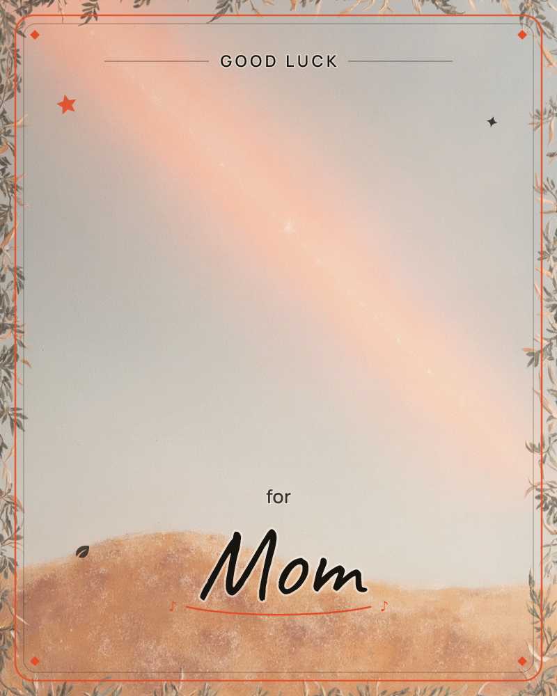 A soft peach beam of light streaks diagonally across a hazy grey-blue sky, falling over a gently rolling sandy hill, a good luck e-card design