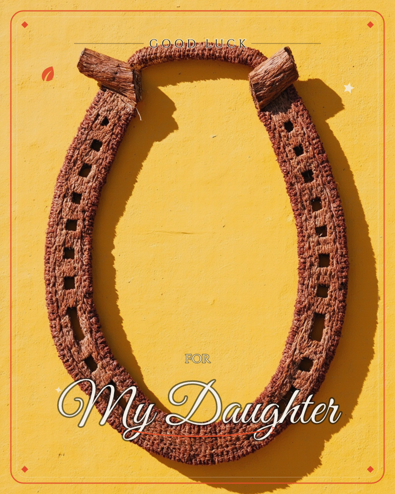 A rustic horseshoe-shaped collar woven from coarse brown rope and wooden toggles hangs against a bold mustard-yellow wall, its texture catching a sharp…, a good luck e-card design