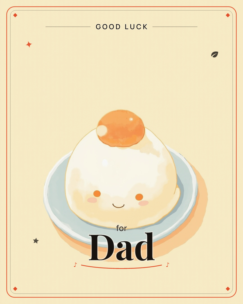 A round mound of white rice sits on a pale blue plate, topped with a shiny orange pickled plum and drawn with a sleepy smiling face and blushing cheeks, a good luck e-card design