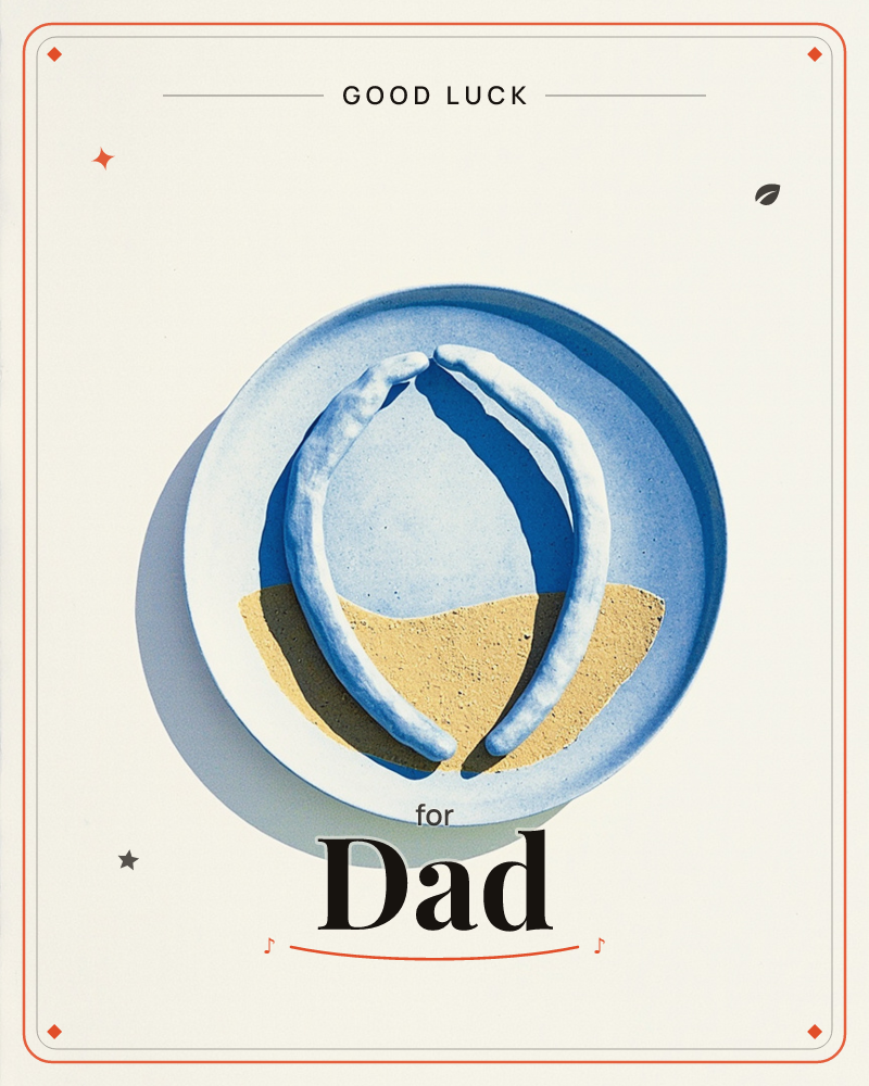 A round blue plate sits alone on a pale cream background, lit sharply from one side so it casts a long soft shadow, a good luck e-card design